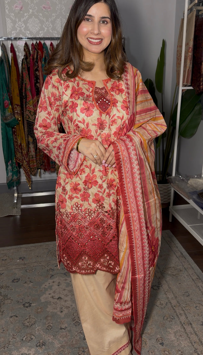 Pakistani orange floral pure cotton embroidered outfit