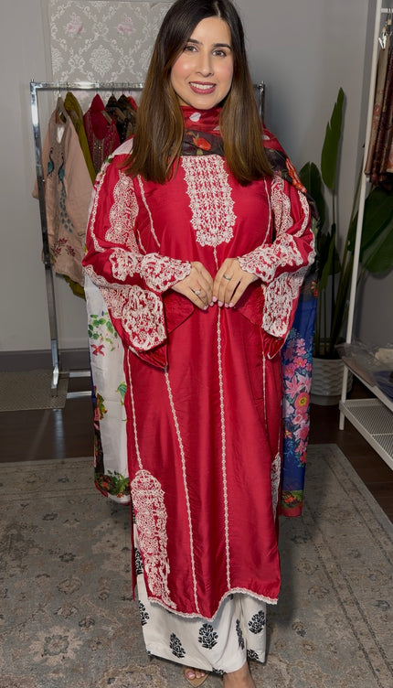 Red and white embroidered outfit
